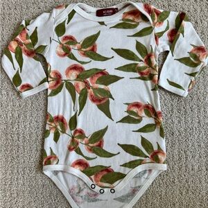 Peach onesie Milkbarn 6-12 months